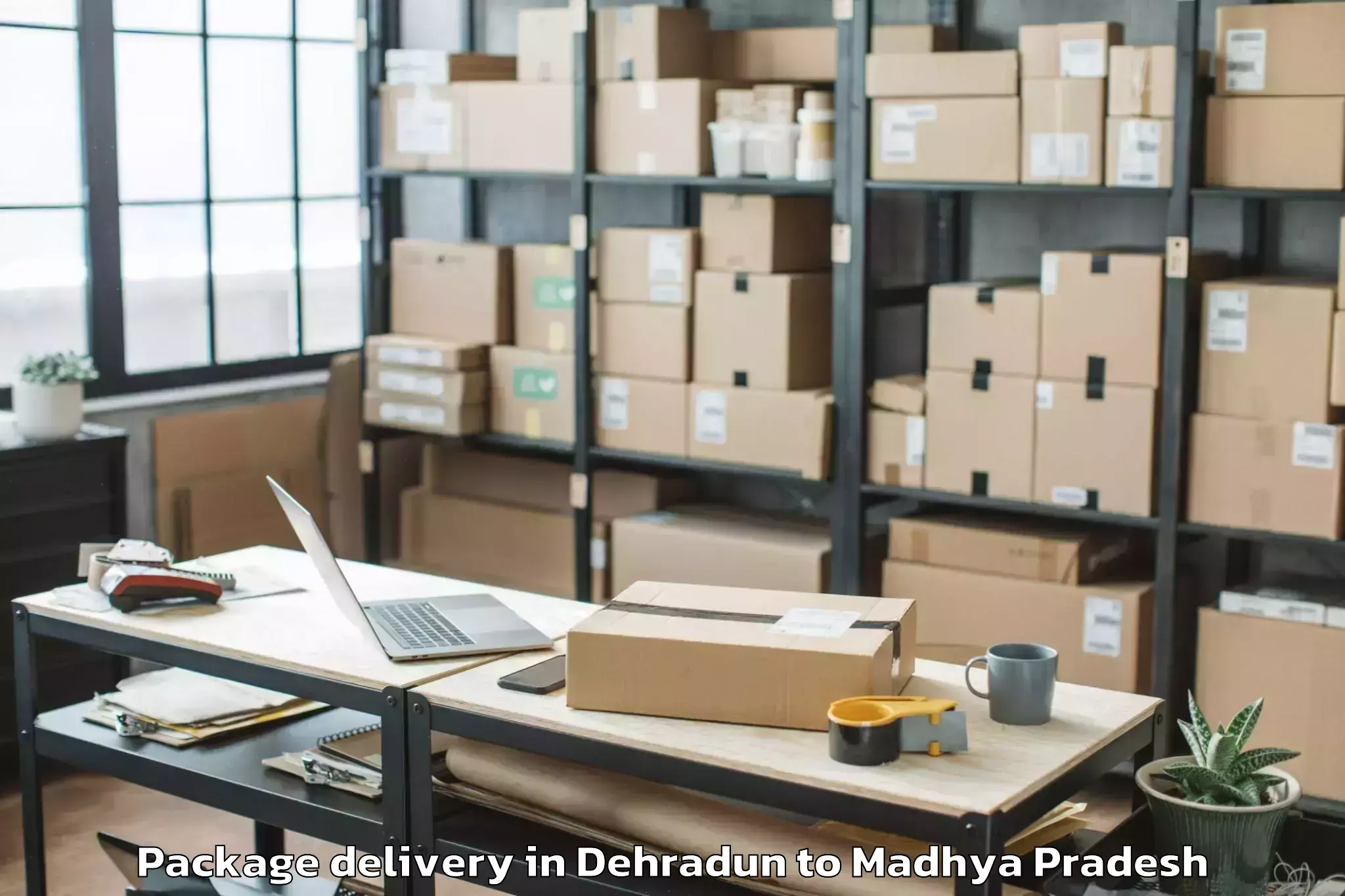 Easy Dehradun to Sardarpur Package Delivery Booking